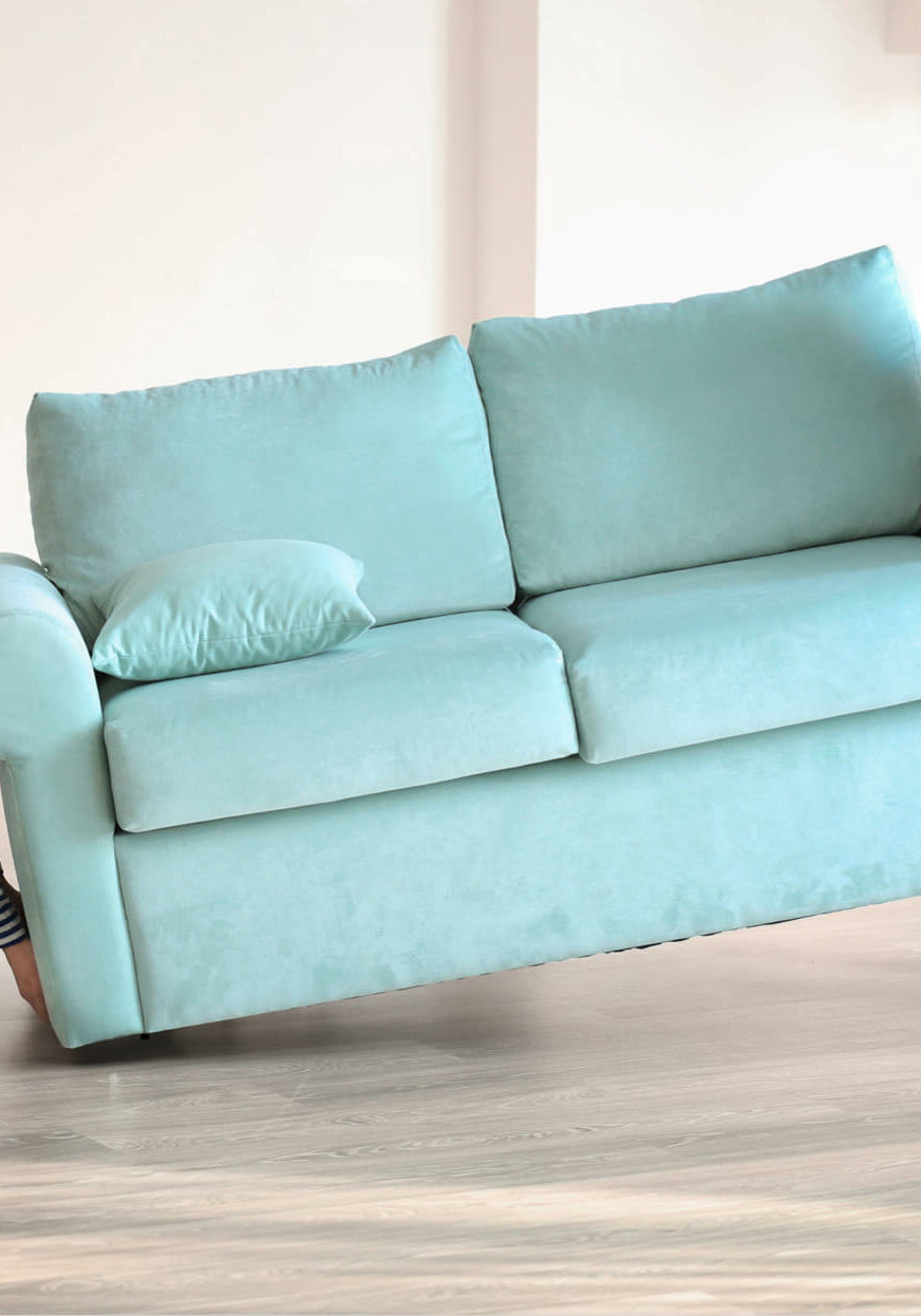 Couple moving sofa | Floor Trends